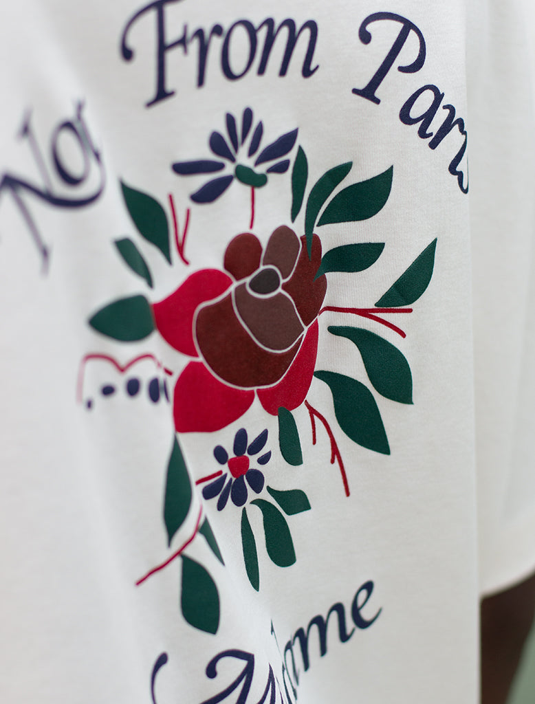 LE T-SHIRT SLOGAN FLEURS